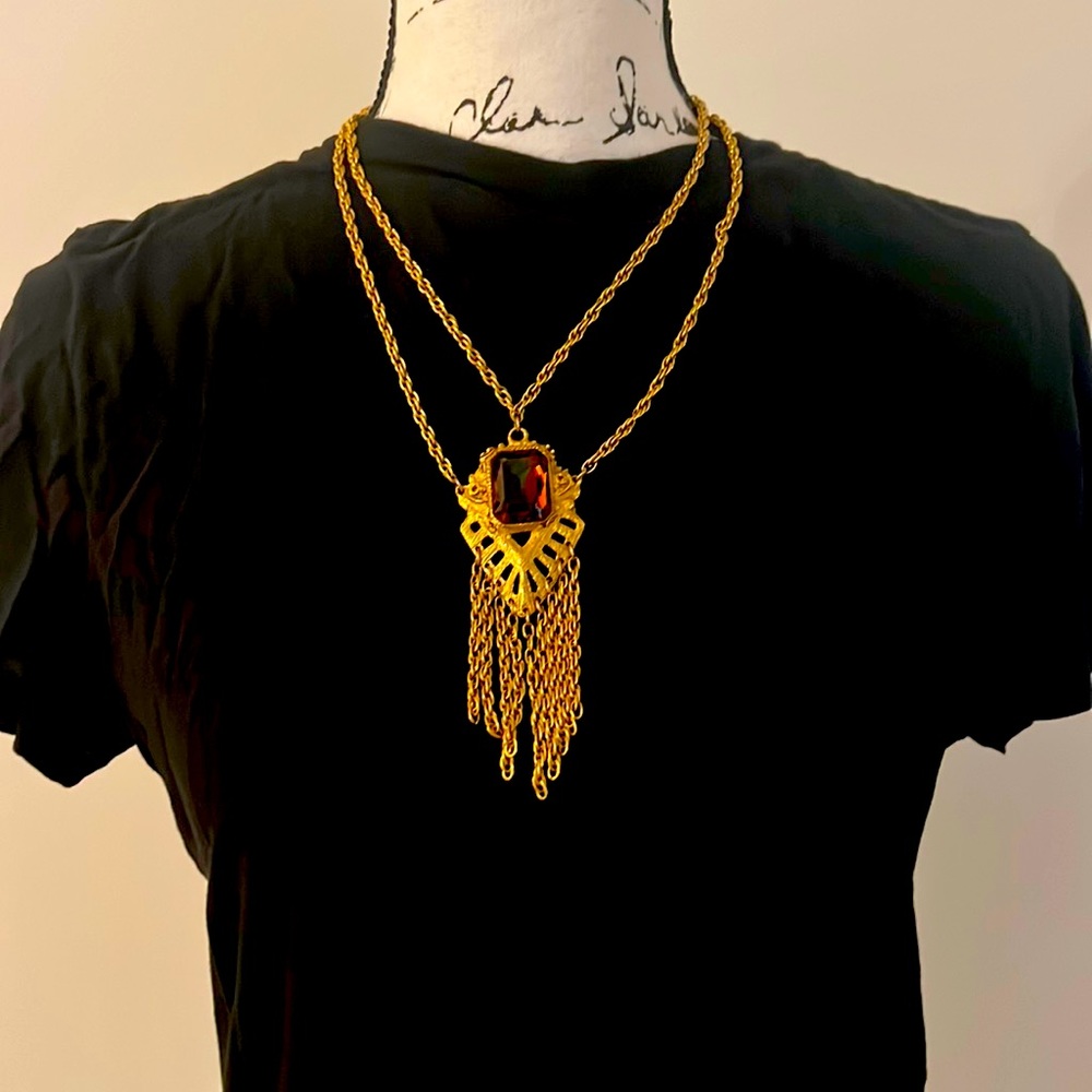 Gold necklace with brown crystal